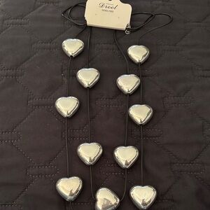 Cutest Silver Heart Necklace on black cord.